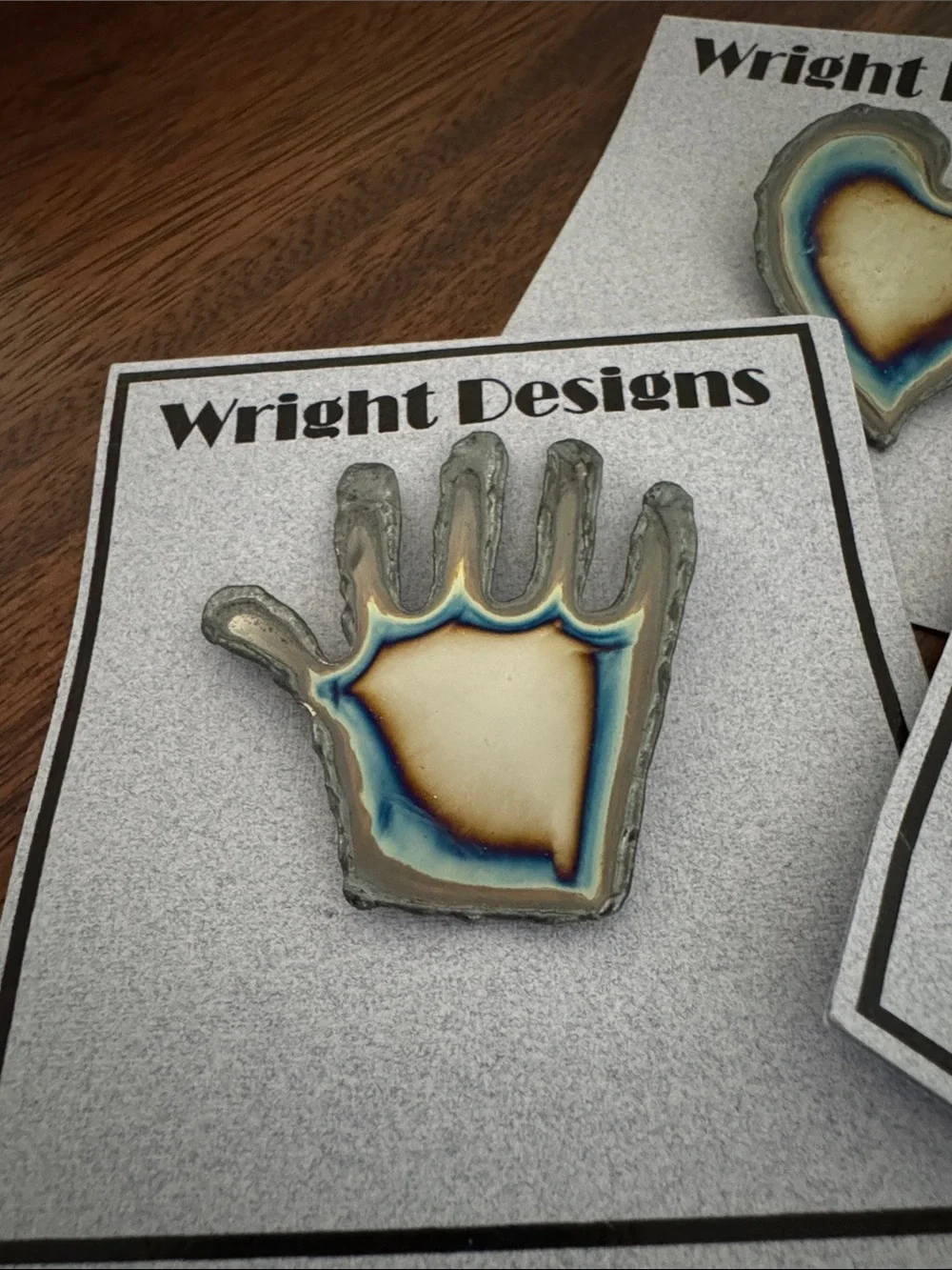 Brooches. Each piece is handcrafted. individually cut out of chrome plated steel
